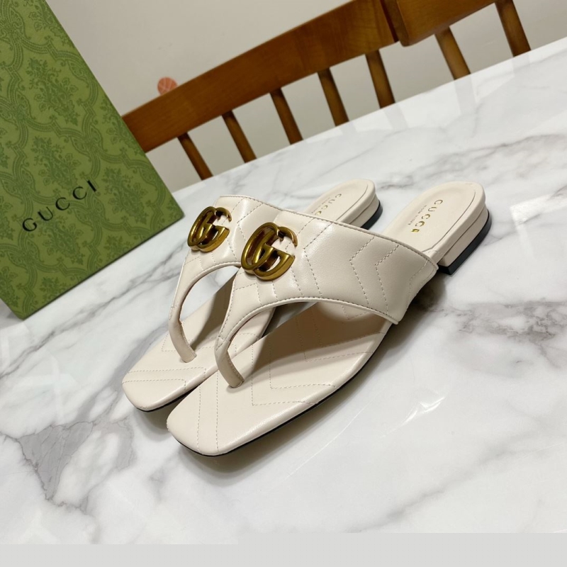 G*u*i slippers